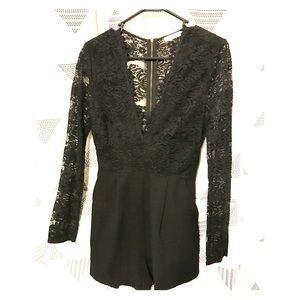 Lush black, lace romper